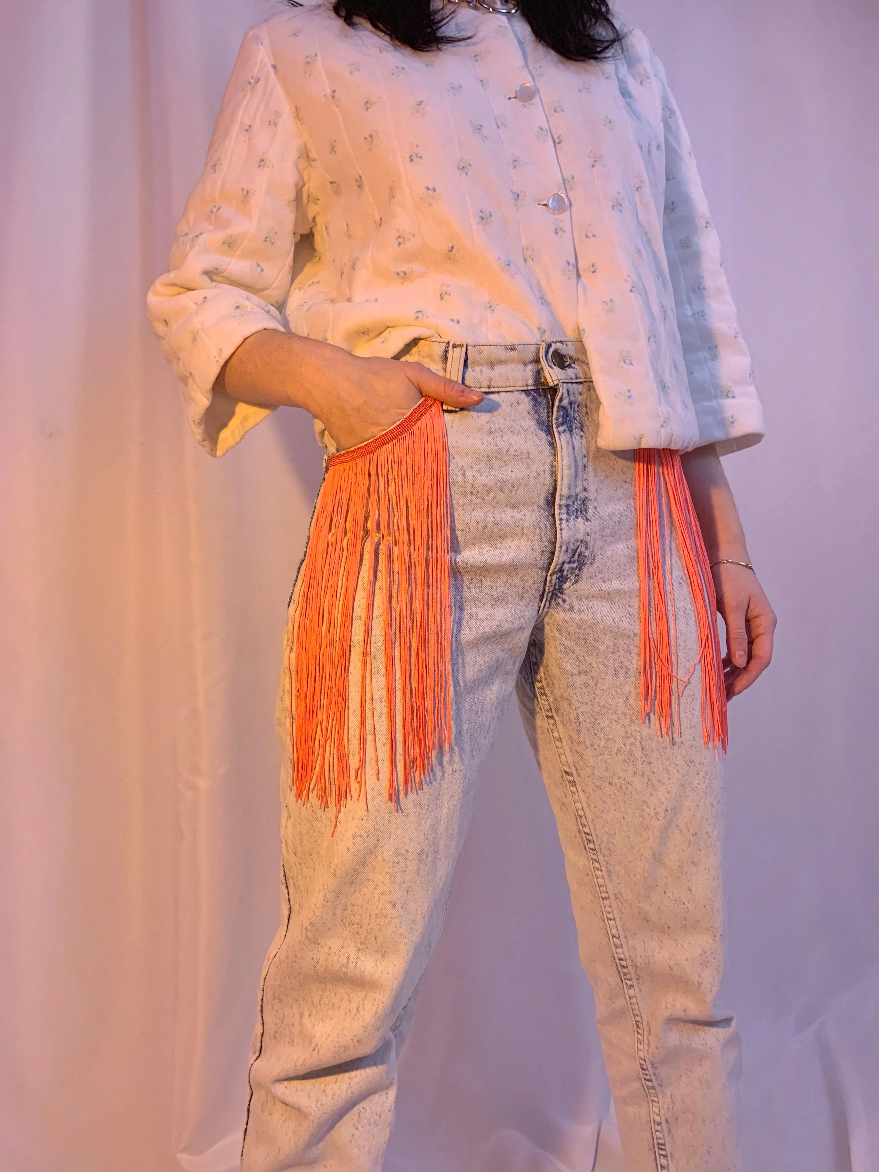 Acid wash fringe jeans