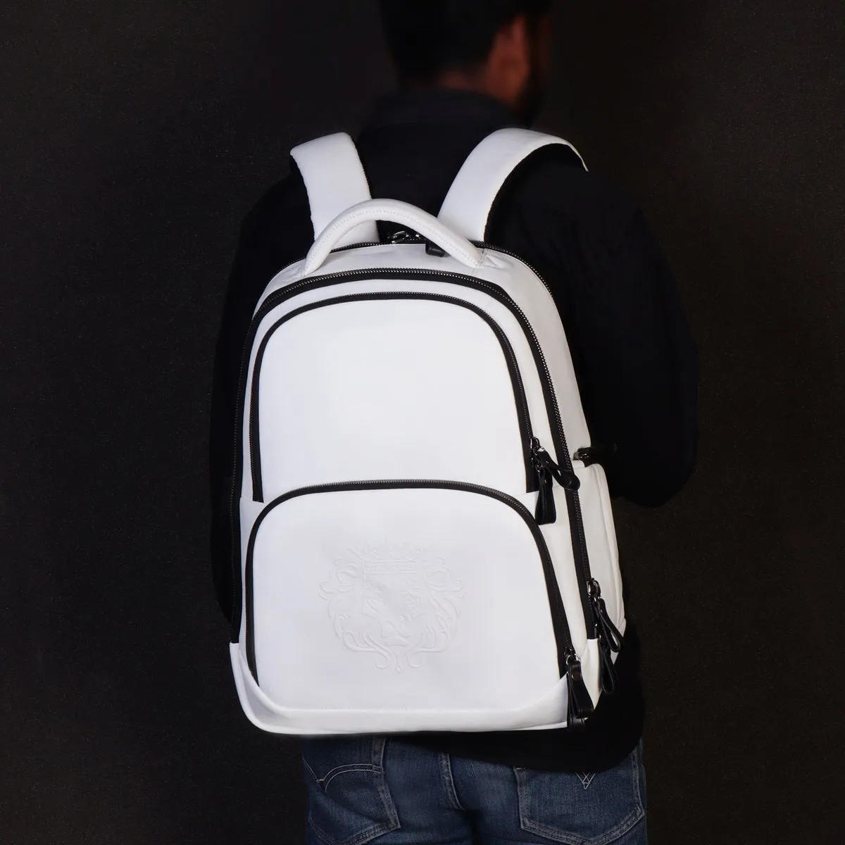 White Leather Multi-Pocket Backpack With Embossed Lion Logo