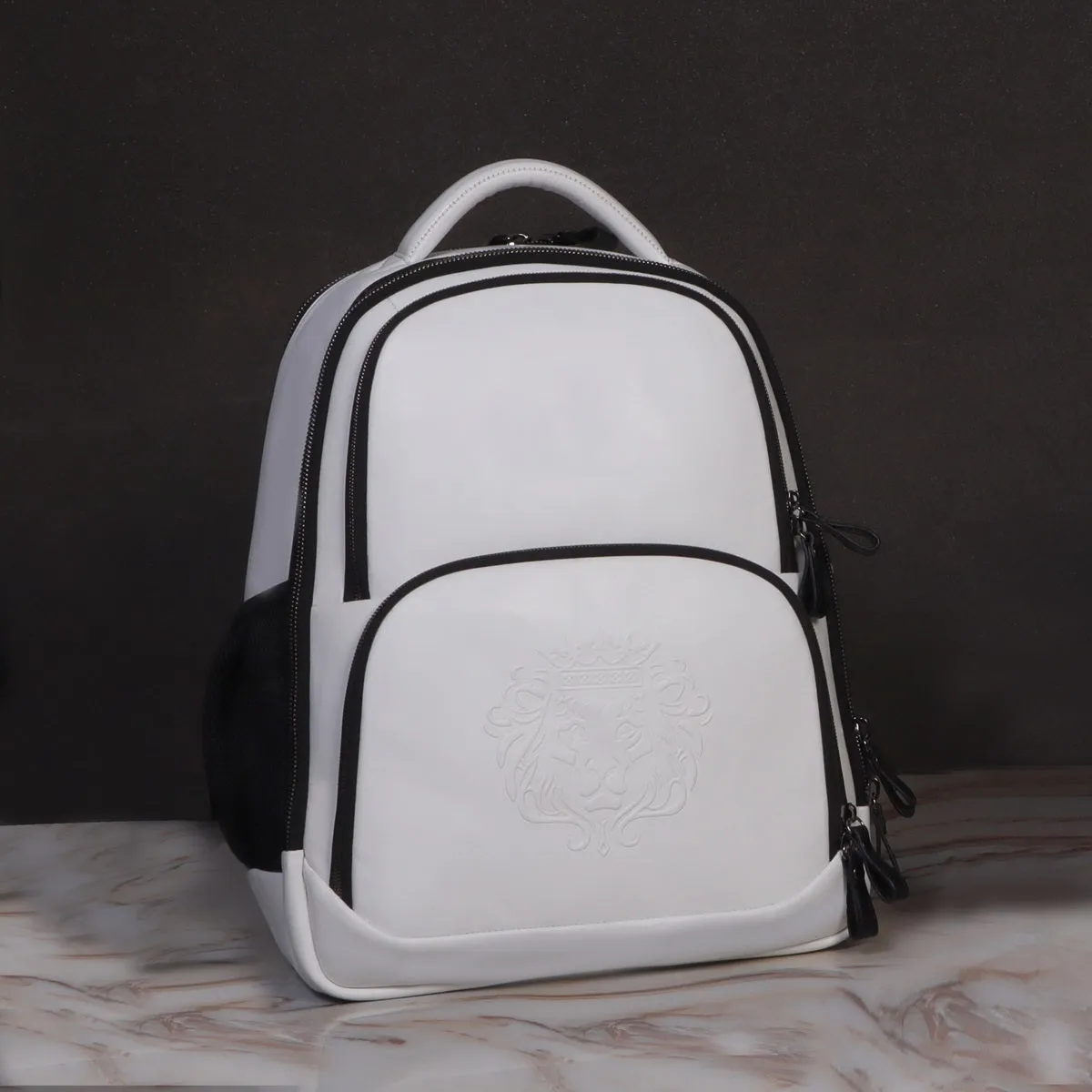 White Leather Multi-Pocket Backpack With Embossed Lion Logo